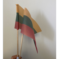 The flag of the Republic of Lithuania is made of wood with a wooden handle
